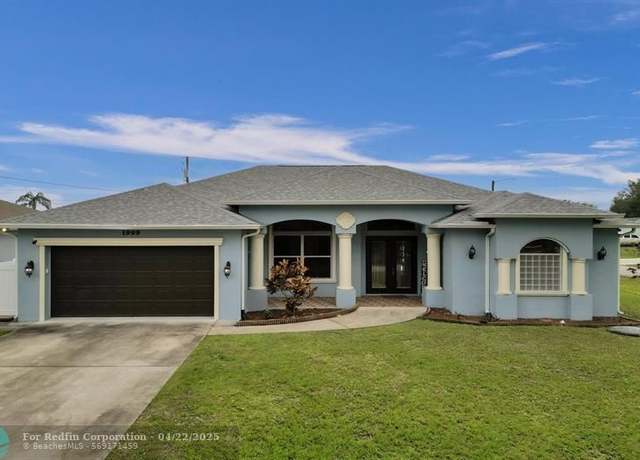 Property at 1999 SW Gourmet St, Port St. Lucie, FL 34953, 4 beds, 3 baths