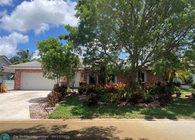 Property at 5321 NW 58th Ter, Coral Springs, FL 33067, 4 beds, 2.5 baths