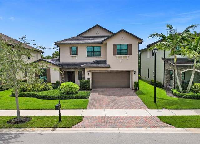 Property at 9360 Carrington Ave, Parkland, FL 33076, 6 beds, 6.5 baths