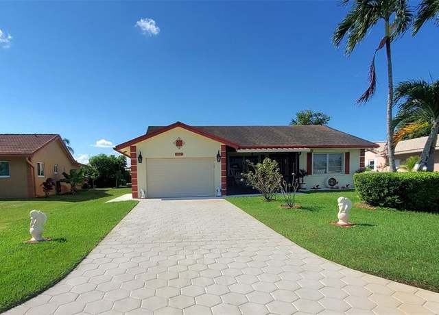 Property at 10407 NW 70th St, Tamarac, FL 33321, 2 beds, 2 baths