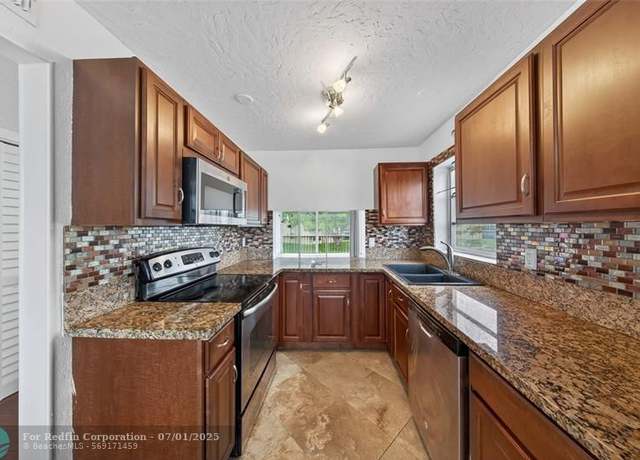 Property at 6070 NW 64th Ave #212, Tamarac, FL 33319, 2 beds, 2 baths