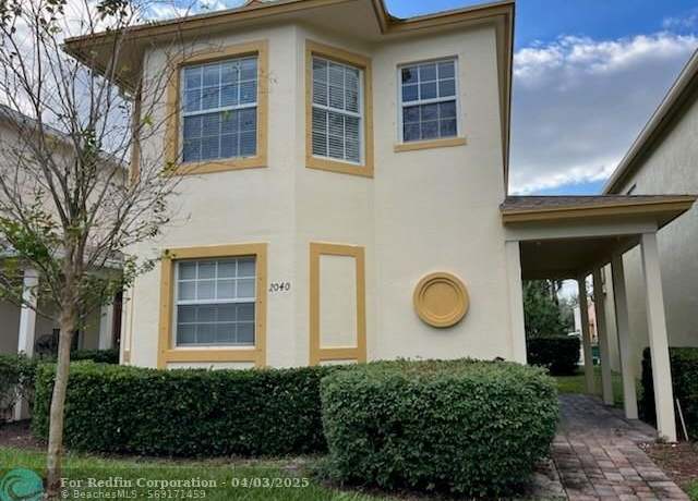 Property at 2040 SE Avon Park Dr, Port St. Lucie, FL 34952, 3 beds, 2.5 baths