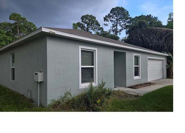 Property at 1717 SW Capehart Ave, Port St. Lucie, FL 34953, 3 beds, 2 baths