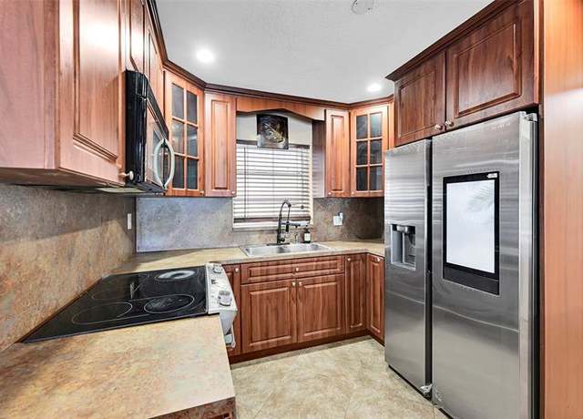 Property at 1390 NE 39th St, Pompano Beach, FL 33064, 3 beds, 2 baths