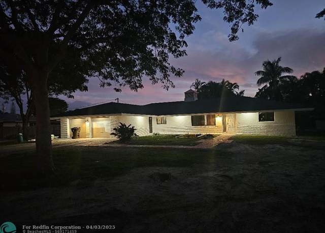 Property at 7676 Overlook Dr, FL 33467, 4 beds, 2 baths