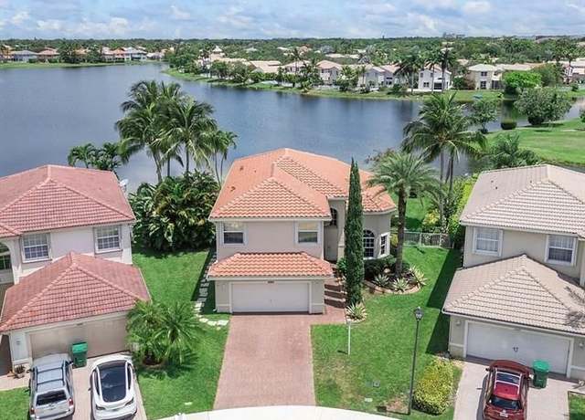 Property at 4866 NW 117th Ave, Coral Springs, FL 33076, 5 beds, 3 baths