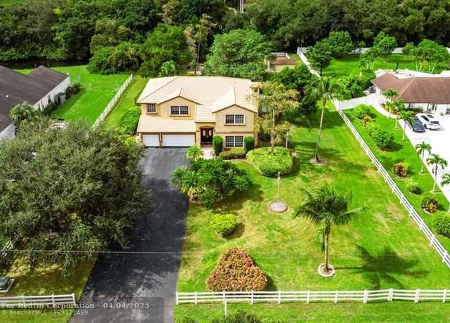 Property at 5811 NW 80th Ter, Parkland, FL 33067, 5 beds, 3 baths
