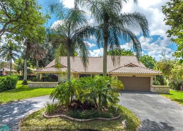 Property at 11266 NW 20th Dr, Coral Springs, FL 33071, 4 beds, 2.5 baths