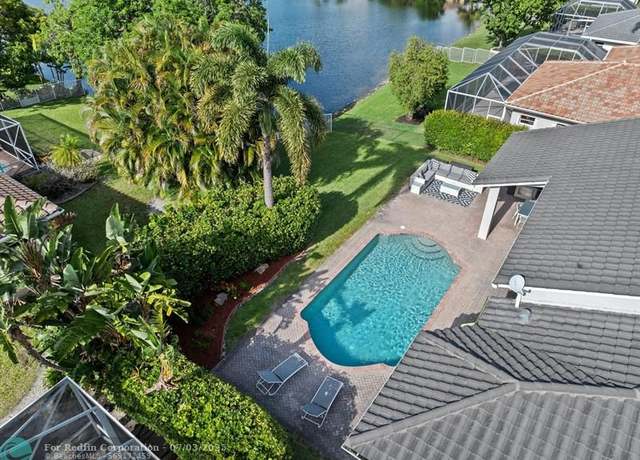 Property at 8943 NW 34th St, Cooper City, FL 33024, 5 beds, 3 baths
