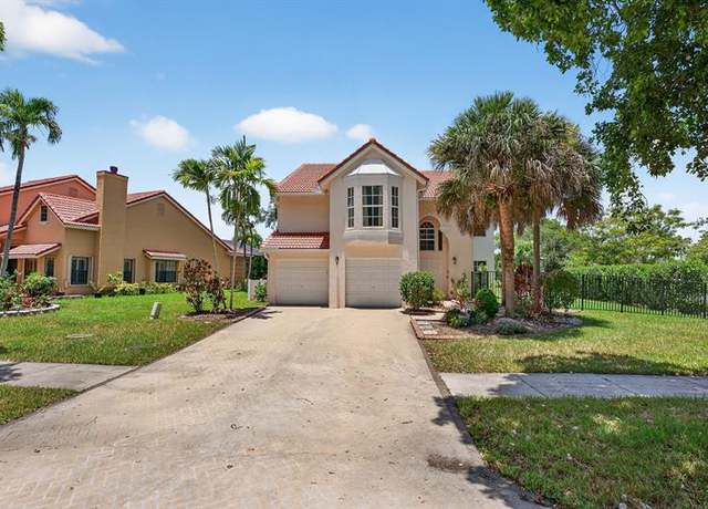 Property at 6401 NW 58th Ter, Parkland, FL 33067, 3 beds, 2.5 baths