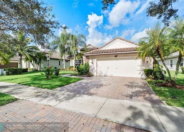 Property at 7009 NW 113th Ave, Parkland, FL 33076, 4 beds, 3 baths
