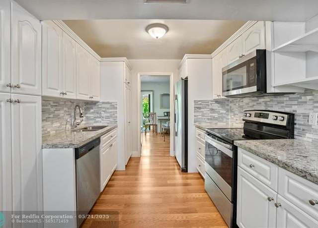 Property at 2701 N 34th Ave Unit 1-A, Hollywood, FL 33021, 4 beds, 2.5 baths