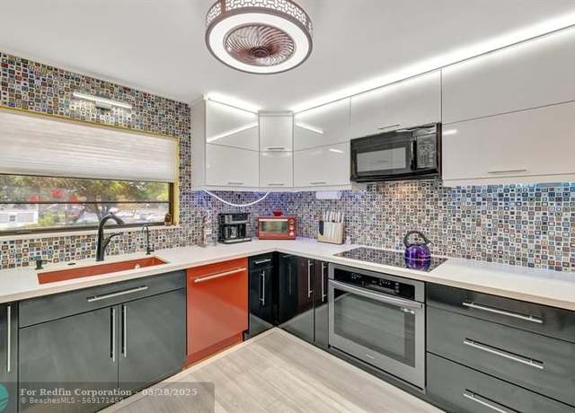 Property at 4970 E Sabal Palm Blvd #203, Tamarac, FL 33319, 2 beds, 2 baths