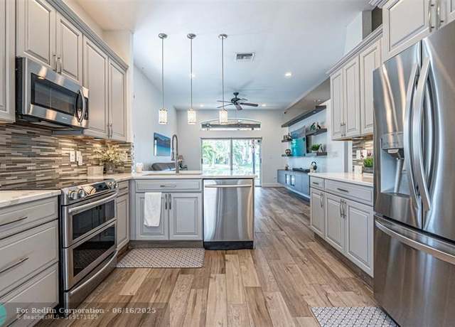 Property at 5350 NW 49th St, Coconut Creek, FL 33073, 3 beds, 2.5 baths