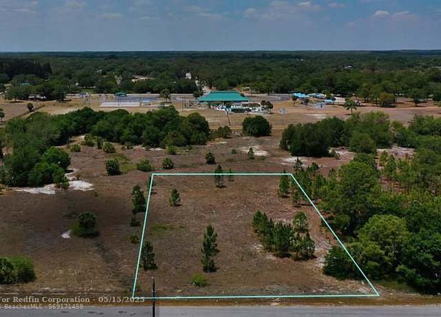 Property at 250 N Jinete St, FL 33440