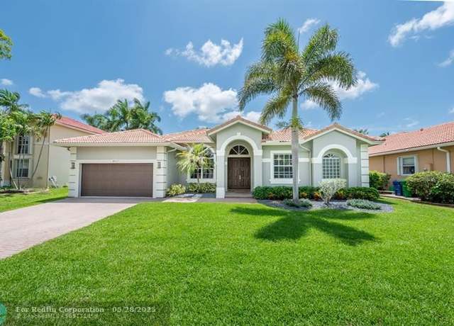 Property at 4927 NW 58th Ave, Coral Springs, FL 33067, 4 beds, 3 baths