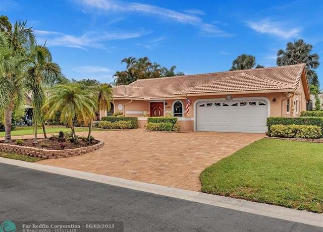 Property at 8640 NW 50th Dr, Coral Springs, FL 33067, 4 beds, 2.5 baths