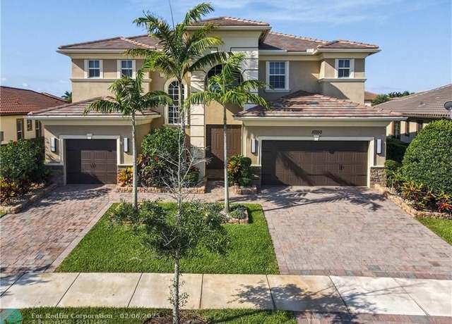 Property at 10350 Peninsula Pl, Parkland, FL 33076, 6 beds, 6.5 baths