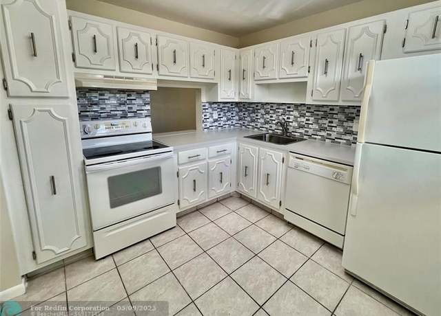 Property at 3000 Riverside Dr Unit 201-1, Coral Springs, FL 33065, 2 beds, 2 baths