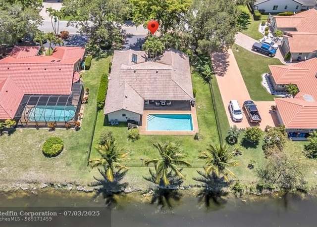 Property at 5618 NW 89th Ave, Coral Springs, FL 33067, 4 beds, 2.5 baths