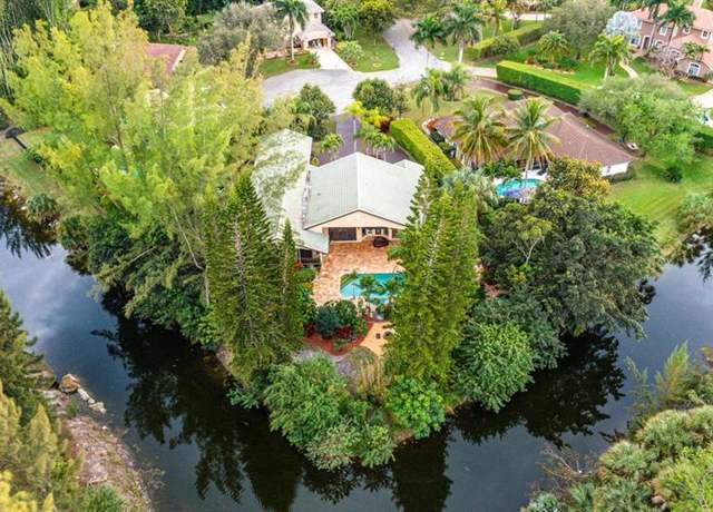 Property at 6011 NW 69th Mnr, Parkland, FL 33067, 5 beds, 4 baths