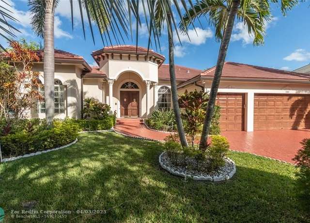 Property at 7080 NW 70th Ter, Parkland, FL 33067, 4 beds, 3 baths