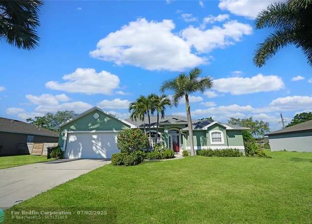 Property at 1932 SW Beard St, Port St. Lucie, FL 34953, 4 beds, 3 baths