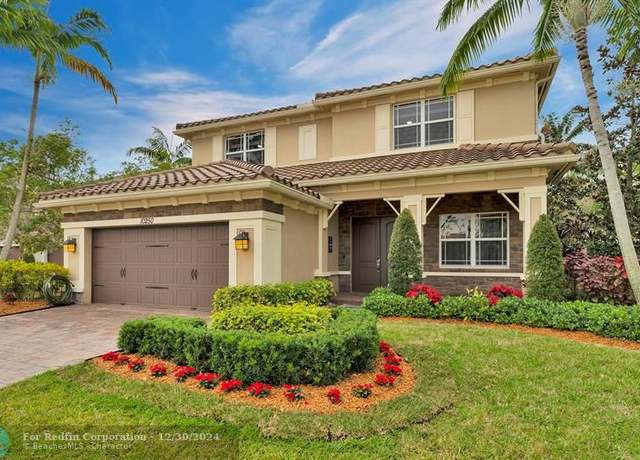 Property at 10250 Peninsula Pl, Parkland, FL 33076, 4 beds, 4 baths