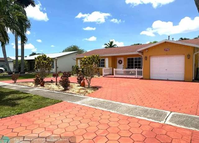 Property at 11420 NW 39th Pl, Sunrise, FL 33323, 3 beds, 2 baths