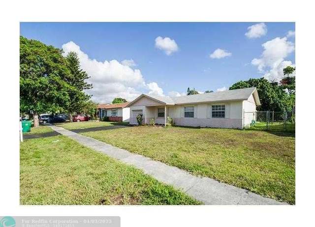 Property at 8231 NW 47 St, Lauderhill, FL 33351, 4 beds, 2 baths