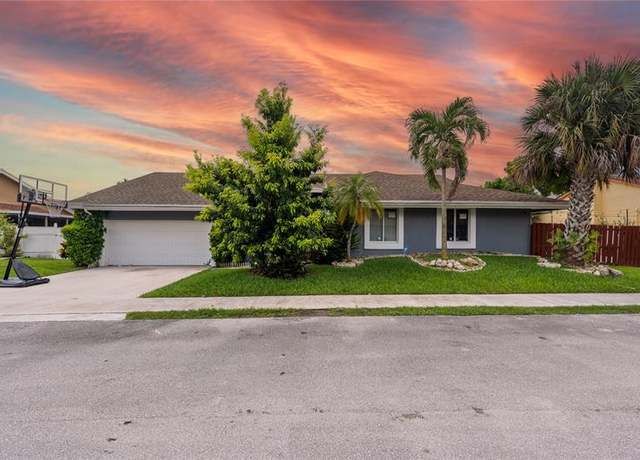 Property at 8810 NW Paradise Ct, Tamarac, FL 33321, 4 beds, 3 baths