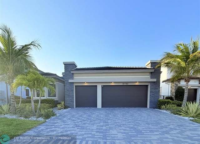 Property at 10785 Coral St, Parkland, FL 33076, 4 beds, 3 baths