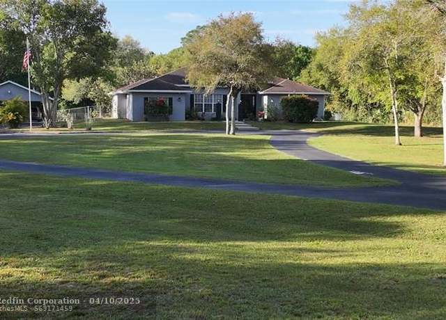 Property at 1234 NE 131st Ln, Okeechobee, FL 34972, 4 beds, 3 baths