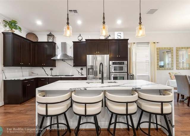 Property at 12115 NW 83rd Pl, Parkland, FL 33076, 4 beds, 3 baths