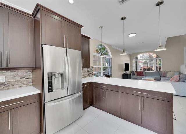 Property at 8785 NW 6th St, Coral Springs, FL 33071, 3 beds, 2.5 baths
