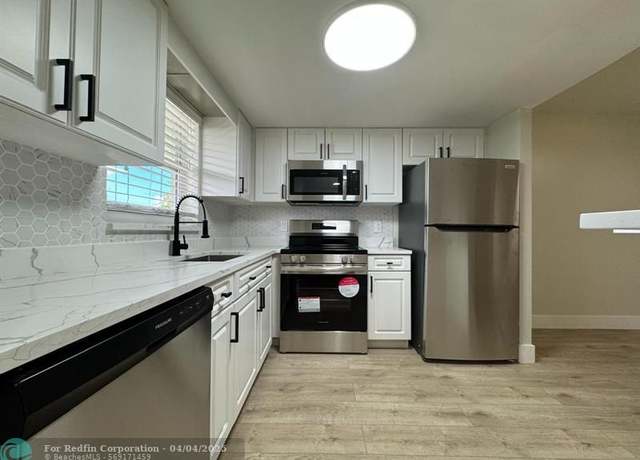 Property at 809 W Oakland Park Blvd Unit J10, Oakland Park, FL 33311, 2 beds, 2 baths