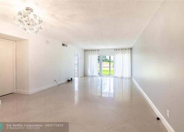 Property at 3300 N Palm Aire Dr #102, Pompano Beach, FL 33069, 2 beds, 2 baths