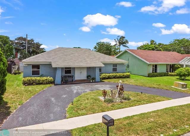 Property at 7412 SW 14th Pl, North Lauderdale, FL 33068, 4 beds, 3 baths