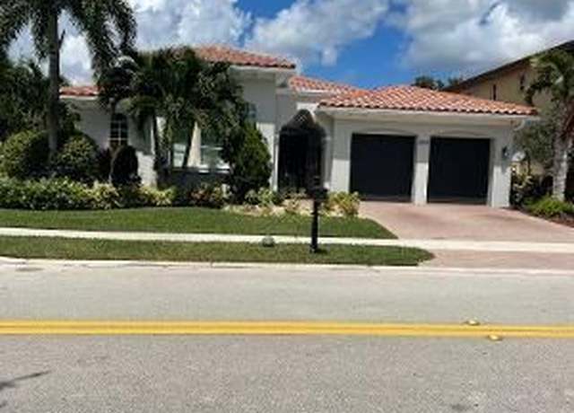 Property at 12415 NW 81st St, Parkland, FL 33076, 4 beds, 3 baths