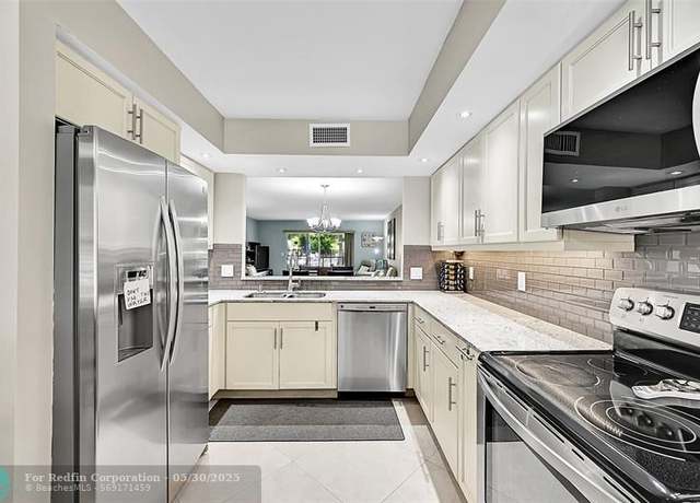 Property at 1703 Andros Isle Unit L1, Coconut Creek, FL 33066, 2 beds, 2 baths