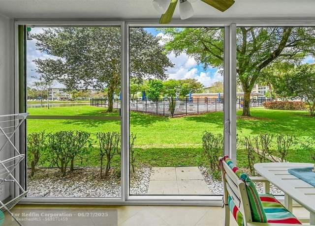 Property at 1703 Andros Isle Unit L1, Coconut Creek, FL 33066, 2 beds, 2 baths