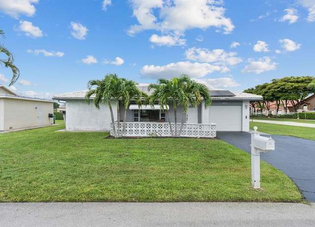 Property at 7105 NW 98th Ter, Tamarac, FL 33321, 3 beds, 2 baths
