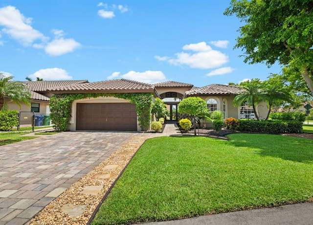 Property at 5217 NW 109th Ln, Coral Springs, FL 33076, 5 beds, 2.5 baths