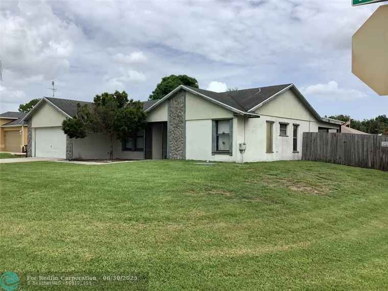 Photo of 449 SW Aster Rd Port St. Lucie, FL 34953
