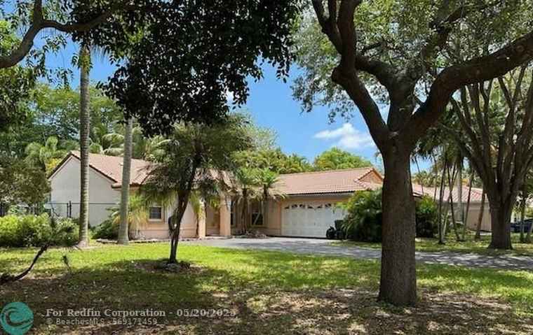 Photo of 4477 NW 65th St Coconut Creek, FL 33073