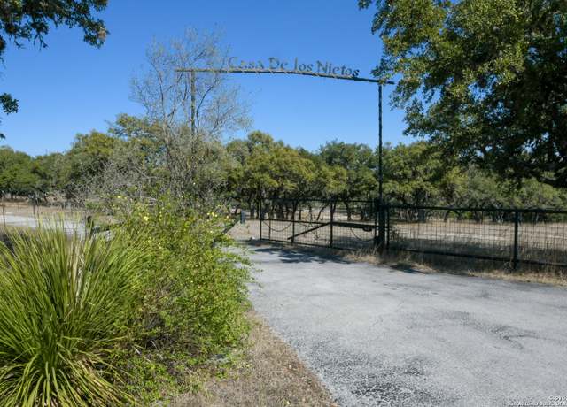 Property at 252 Bruce Leeder Ln, Pipe Creek, TX 78063-5402, 4 beds, 2.5 baths