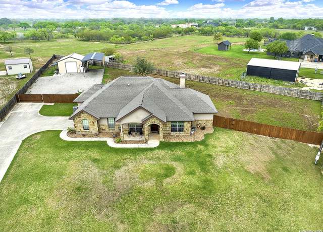 Property at 221 S Monkhouse St, Poth, TX 78147, 4 beds, 2 baths