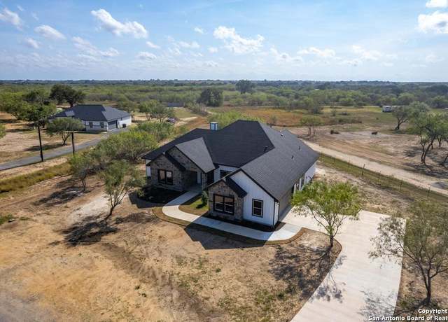 Property at 116 Hidden Ranch Ct, Floresville, TX 78114, 4 beds, 3 baths