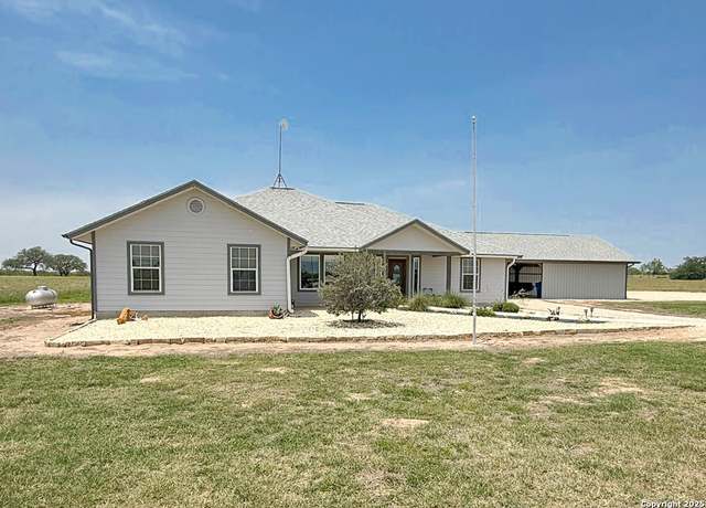 Property at 1185 County Road 7718, Devine, TX 78016, 4 beds, 2.5 baths