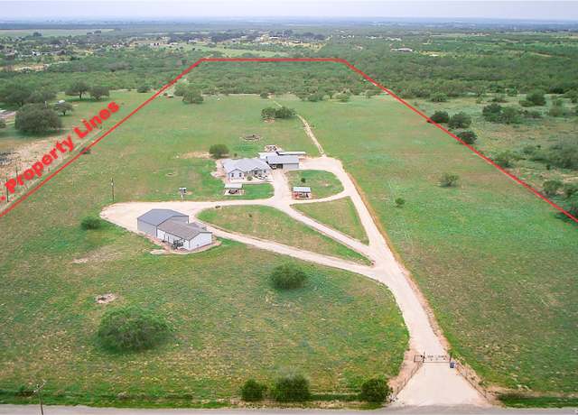 Property at 1185 County Road 7718, Devine, TX 78016, 4 beds, 2.5 baths